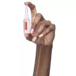 traitement genesis Kérastase-ampoules cure fortifiante-aminexil-gingembre-viperide-dans une main