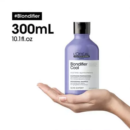 L'Oréal Serie Expert Blondifier Cool Shampoing cheveux blonds 300ml posé sur une main